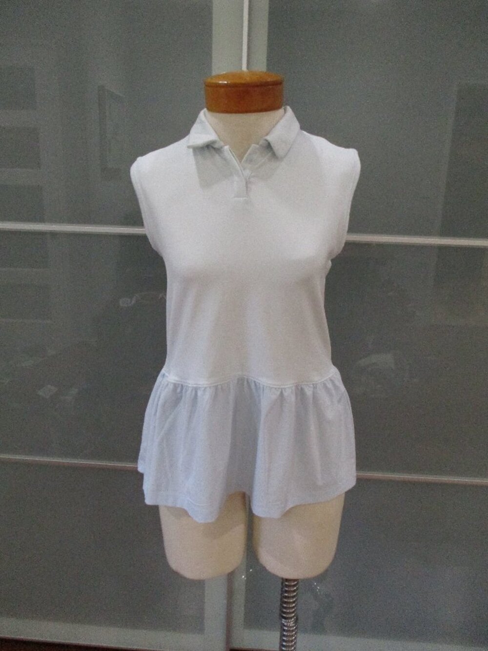 Under Armour Golf Heat Gear Peplum Sleeveless Top